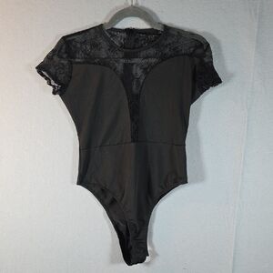 Elegant Black Lace Bodysuit Size Small NWOT.